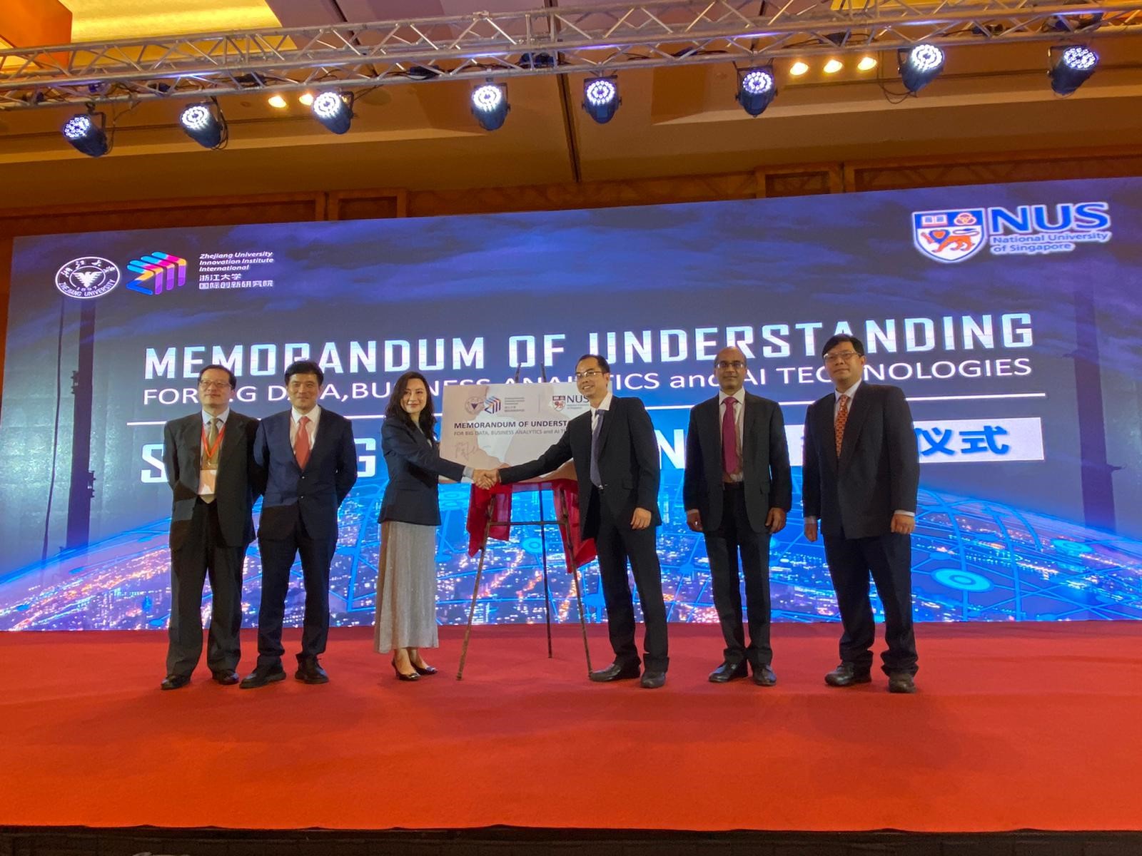 Left to right: <br>
Mr Chen Xiaofeng, Deputy Dean of Zhejiang University Innovation and Entrepreneurship Institute, <br>
Dr Matthew Wang Yang, Executive Dean of ZIII, <br>
Ms Tao Hong, Executive Dean of ZIII, <br>
Associate Professor James Pang, Co-Director of NUS BAC, <br>
Professor Mohan Kankanhalli, Dean and Provost’s Chair at NUS Computing, Provost’s Chair, <br>
Professor Melvyn Sim, Professor and Provost's Chair at the Department of Analytics & Operations, NUS Business School 