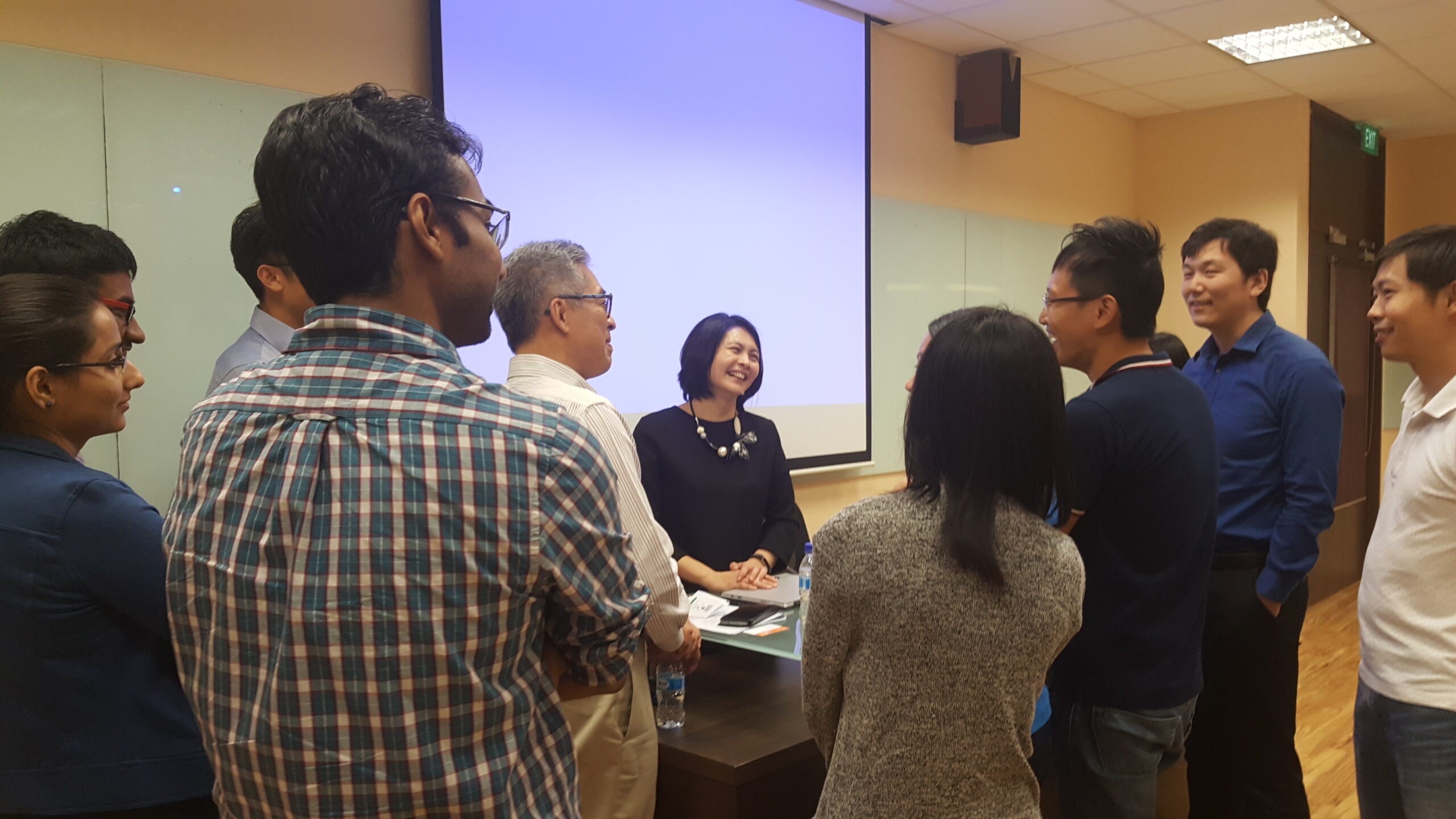 Ms Chiang Yoke Fun (middle) from SAS Institute having a discussion post presentation